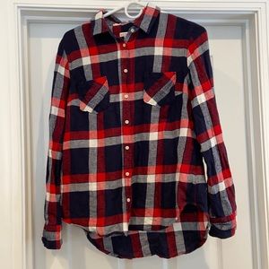 Navy Blue, white, and red button down flannel shirt. Size medium